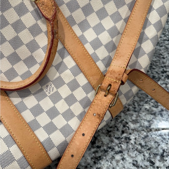 Louis Vuitton duffle bag, two of the straps are damaged as shown in pictures. - Picture 7 of 15
